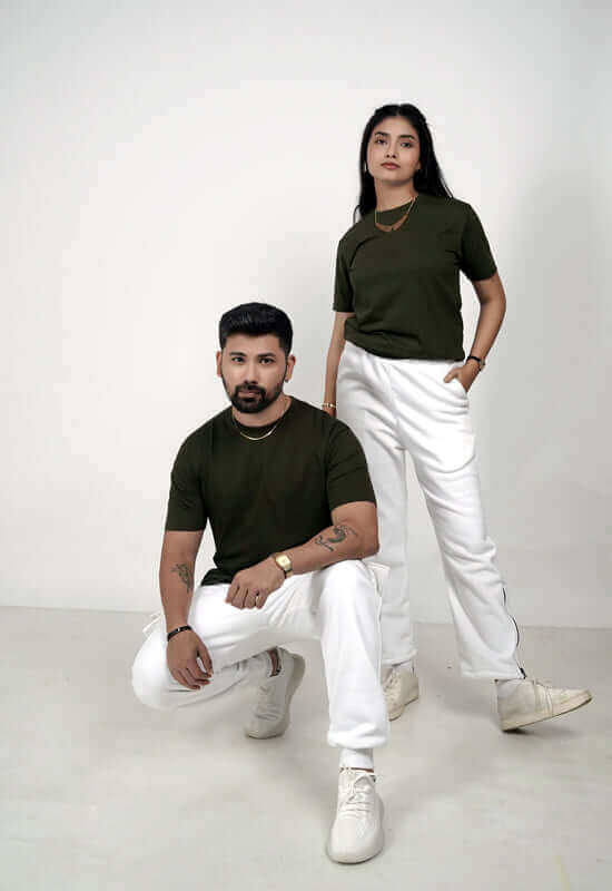 Sustainable fashion look with unisex models in green, olive green organic cotton tees by The Hrad for men & women